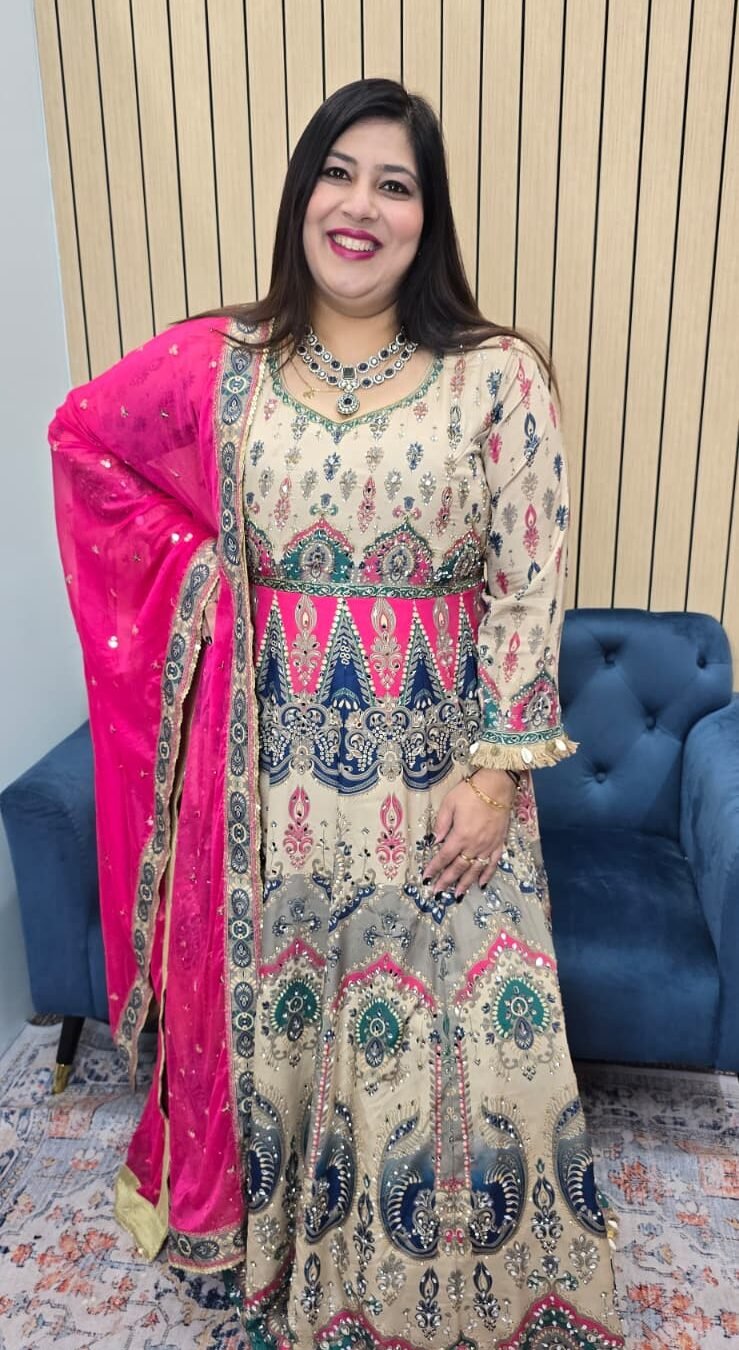 Elegant cream Anarkali gown with multicolored ethnic prints